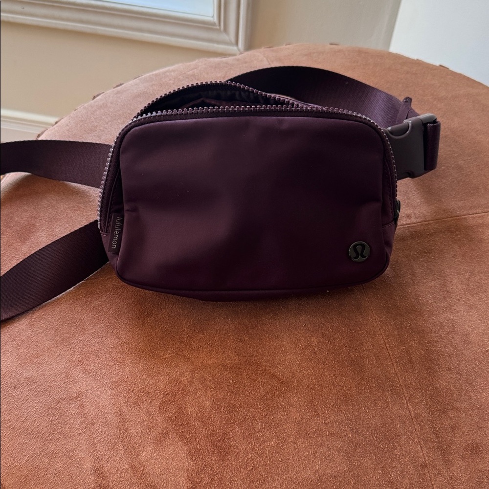 Lululemon Athletica rich burgundy Belt Bag never worn